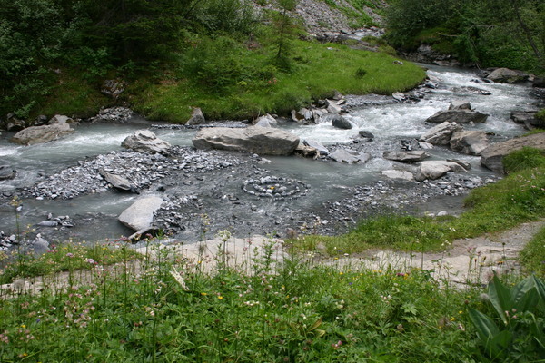 The stream at Gurnigel with a stone pattern installation
